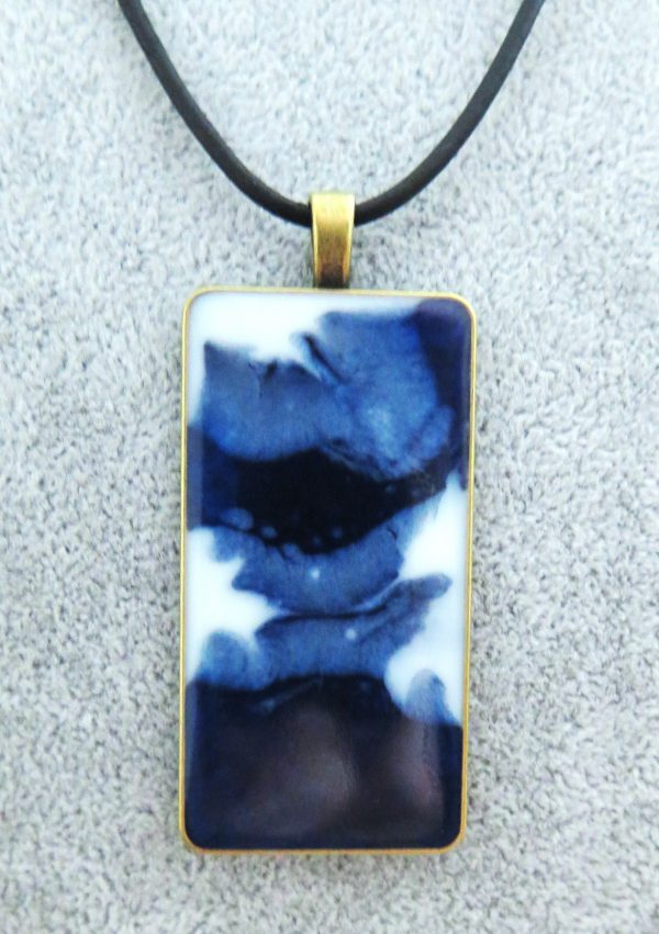 Epoxidharz Anhänger 50x25 mm in den Farben Blau, Schwarz und Weiß  (ohne Halsband)